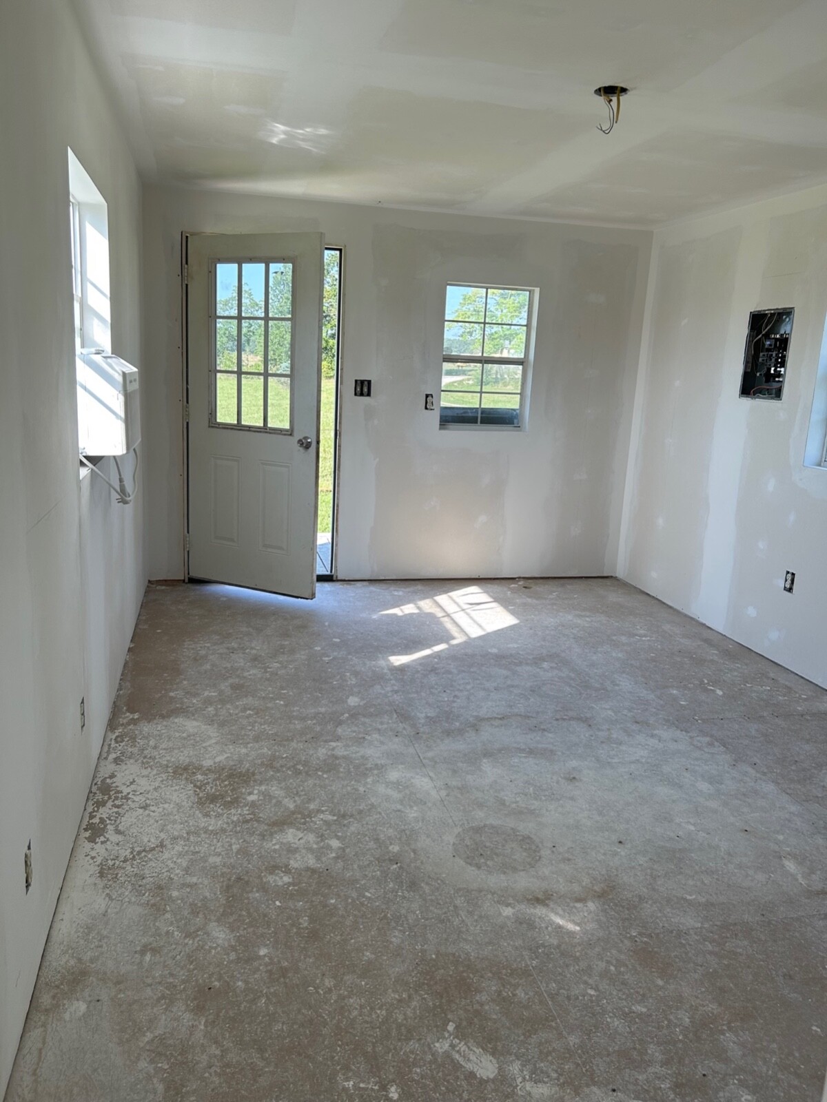 Unfinished Tiny house for sale 12 x 32 ft with 4′ porch Derksen home $27,500