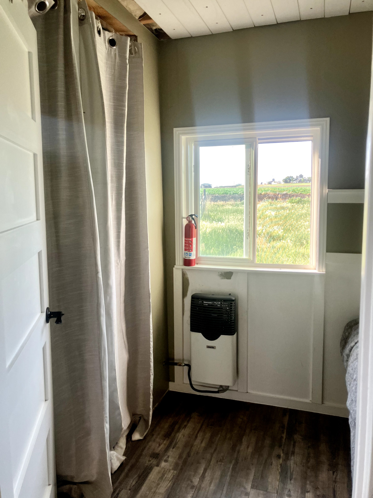 Tiny house for sale – on skids (12x24ft) 95% Finished, Blue, with small porch