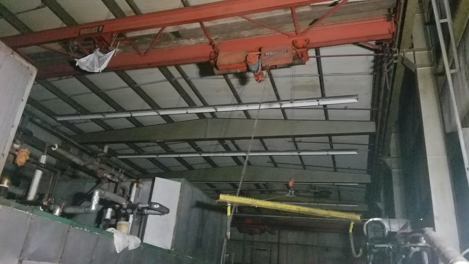 Steel Building aprox 51 feet by 109 feety 25 ft tall green building 2 trolley