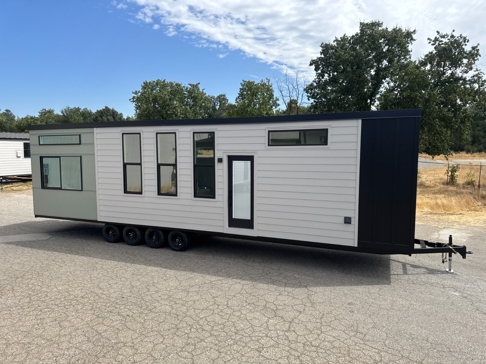 New Forever Tiny Home on Wheels 40′ Suite with bed closet & full kit & bath