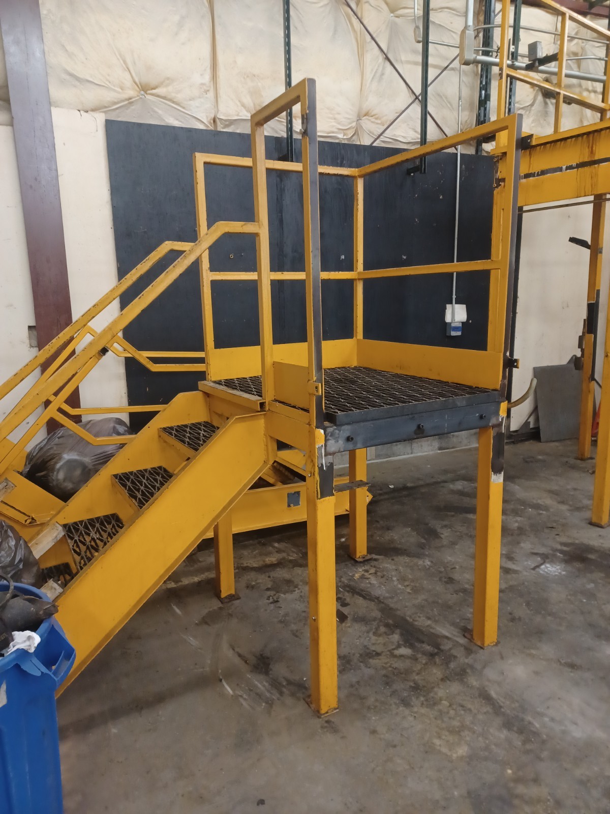 STEEL CONSTRUCTED MEZZANINE | COLOR: YELLOW | MULTI-LEVEL | MODULAR CONSTRUCTION
