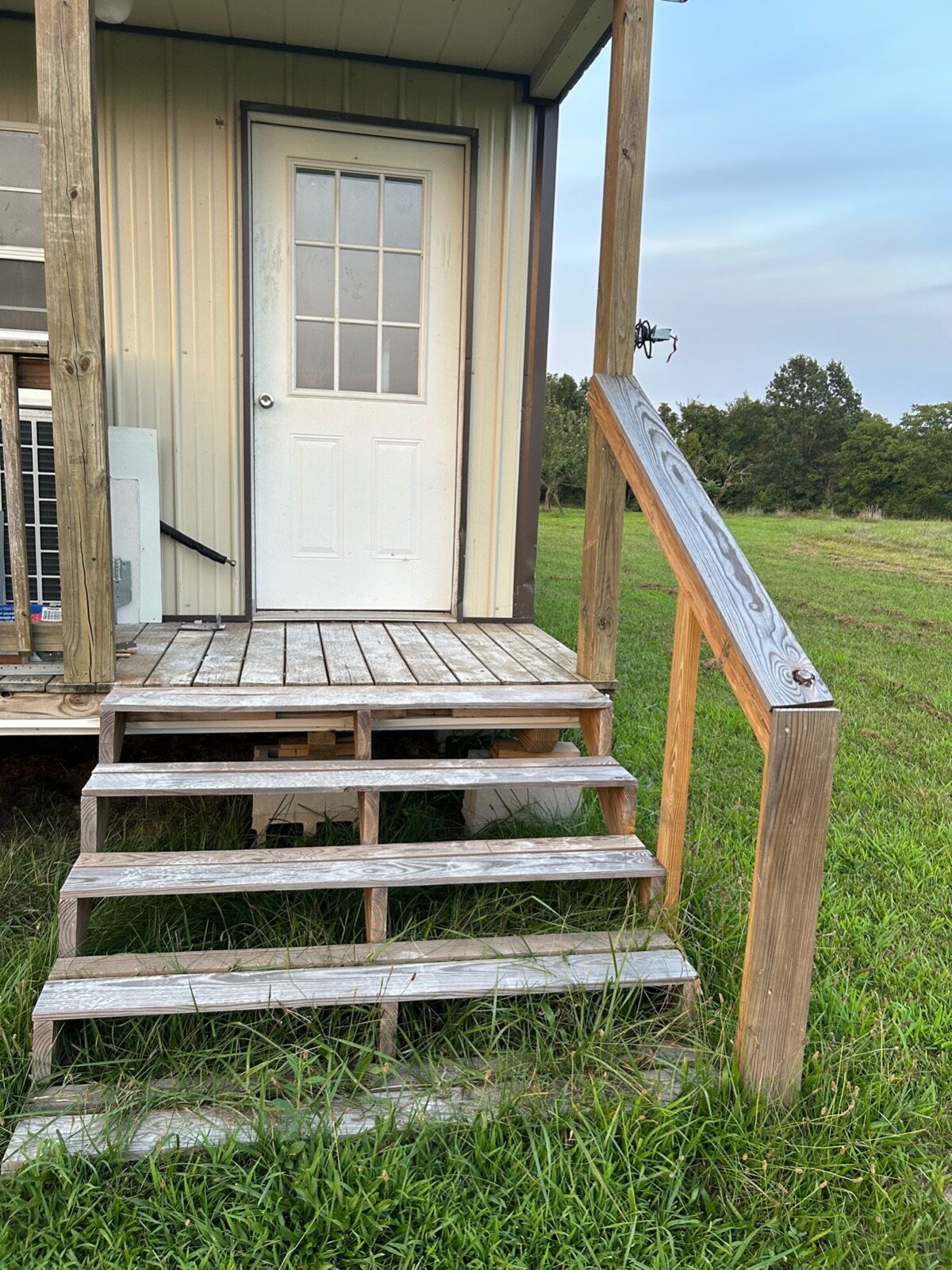 Unfinished Tiny house for sale 12 x 32 ft with 4′ porch Derksen home $27,500