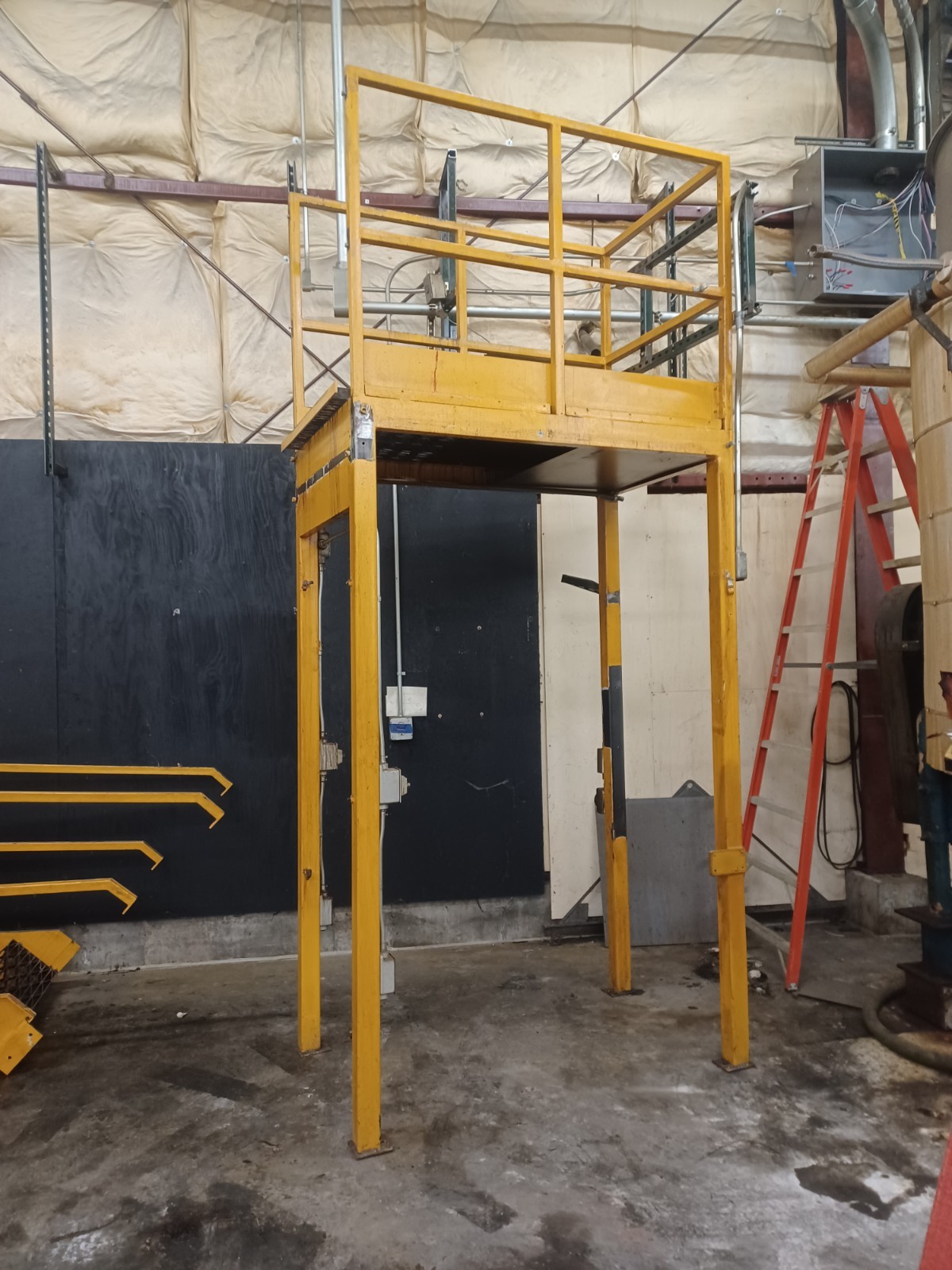 STEEL CONSTRUCTED MEZZANINE | COLOR: YELLOW | MULTI-LEVEL | MODULAR CONSTRUCTION