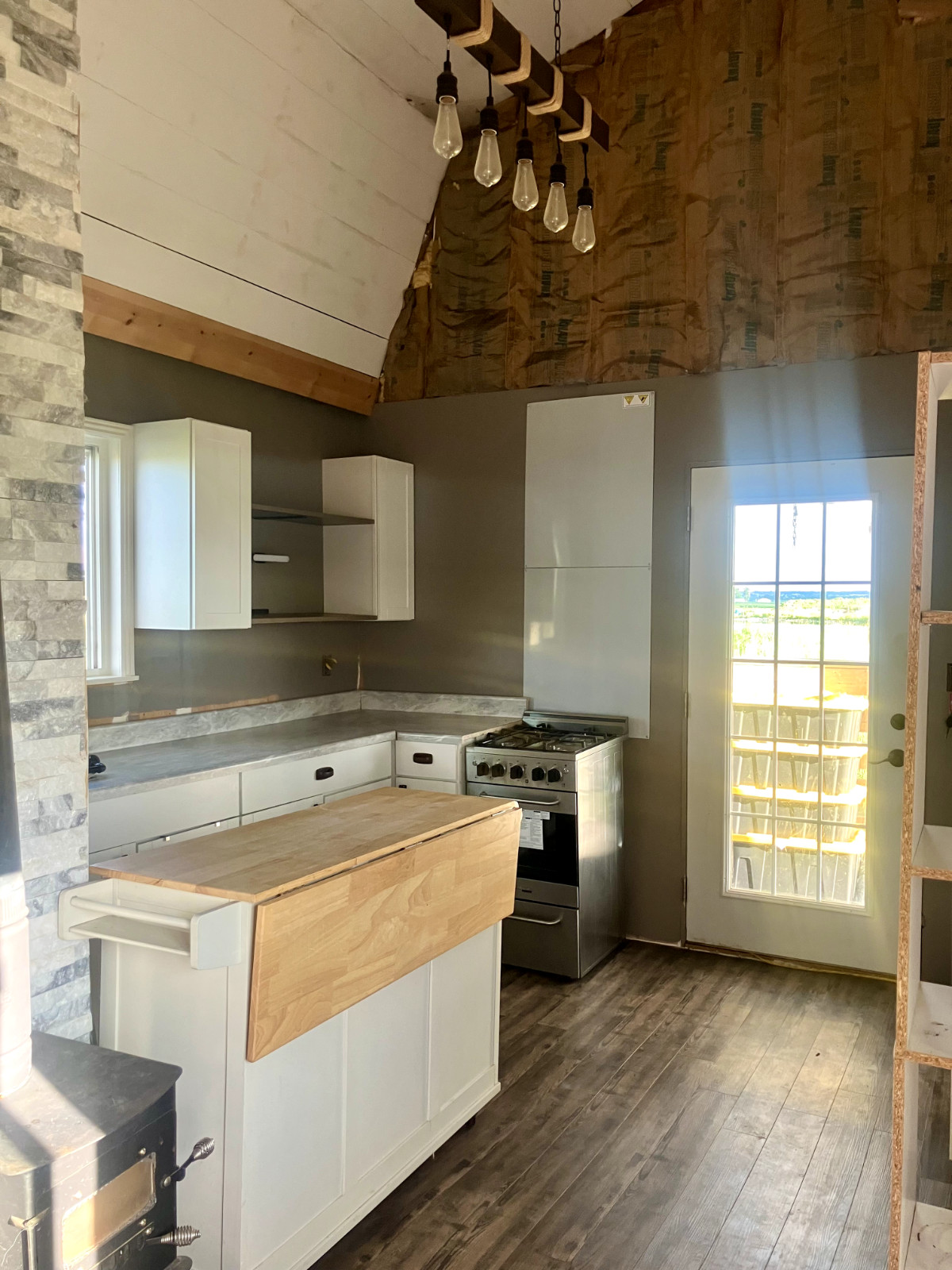 Tiny house for sale – on skids (12x24ft) 95% Finished, Blue, with small porch