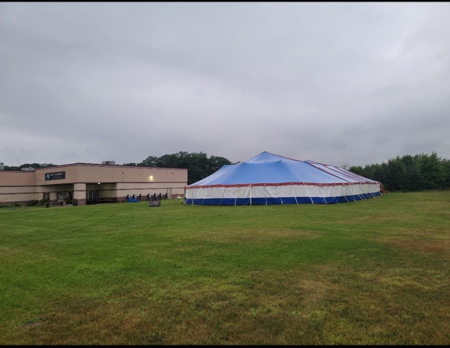 Large Tent 80’x100′ includes Top Poles and Stakes (no side walls)