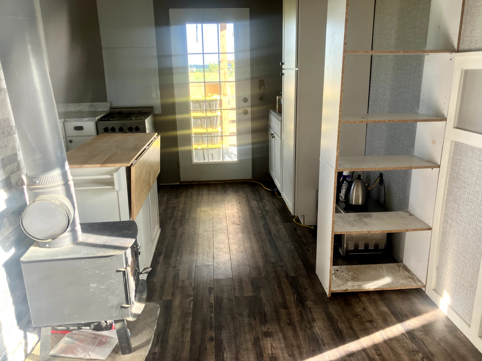Tiny house for sale – on skids (12x24ft) 95% Finished, Blue, with small porch