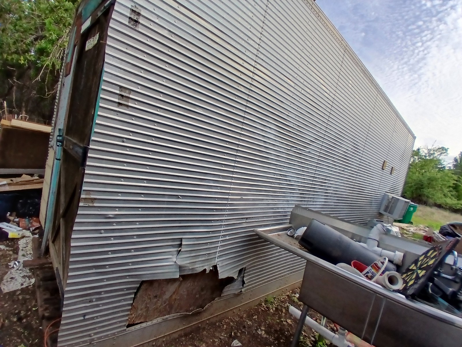 Metal Wood Modular Prefabricated Building Damaged Exterior Needs Repair