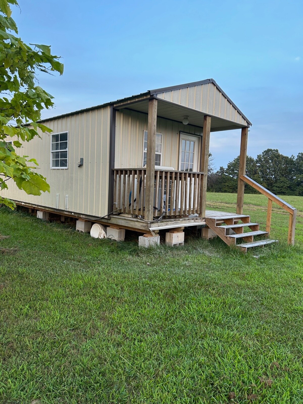 Unfinished Tiny house for sale 12 x 32 ft with 4′ porch Derksen home $27,500