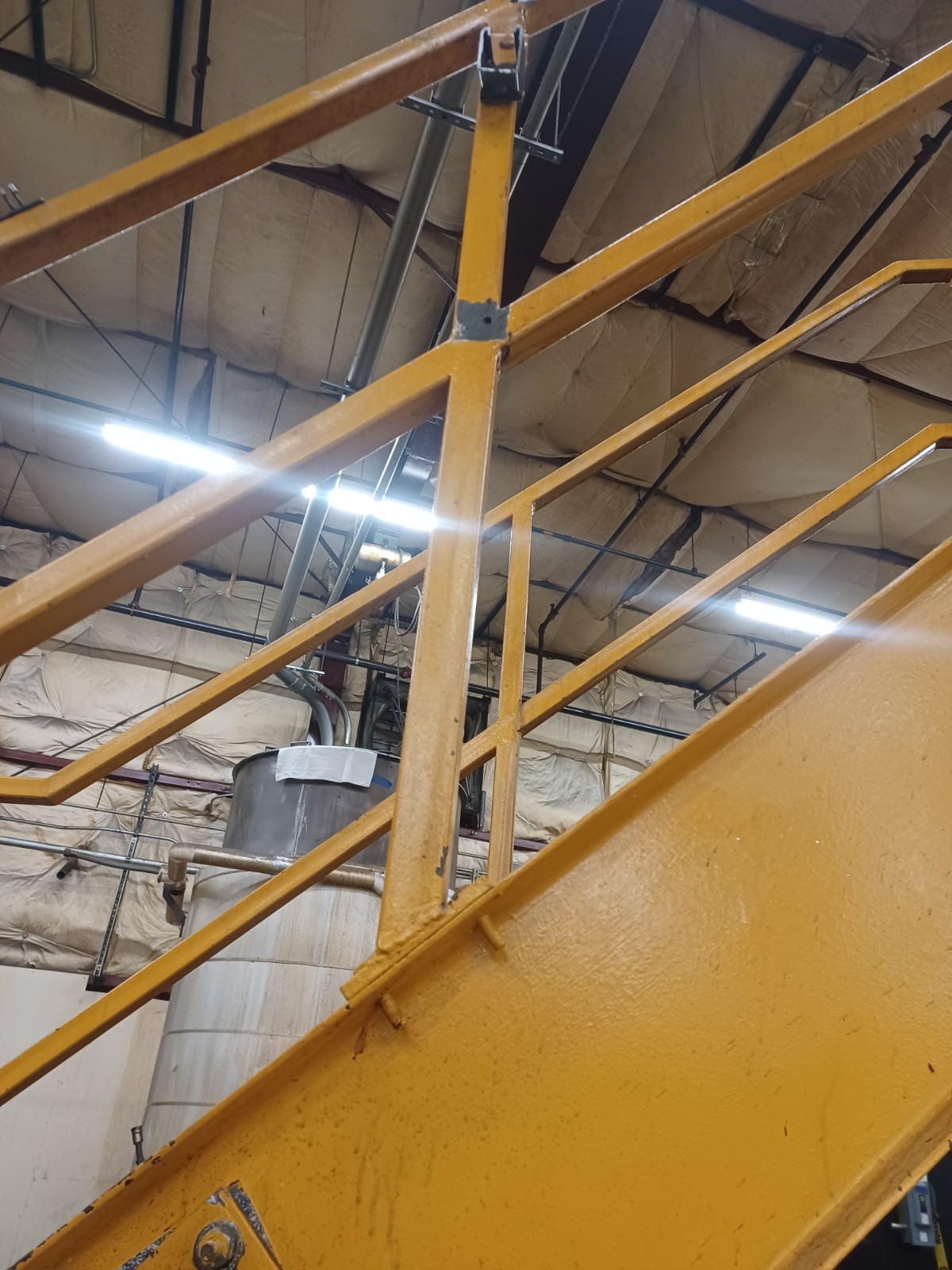 STEEL CONSTRUCTED MEZZANINE | COLOR: YELLOW | MULTI-LEVEL | MODULAR CONSTRUCTION