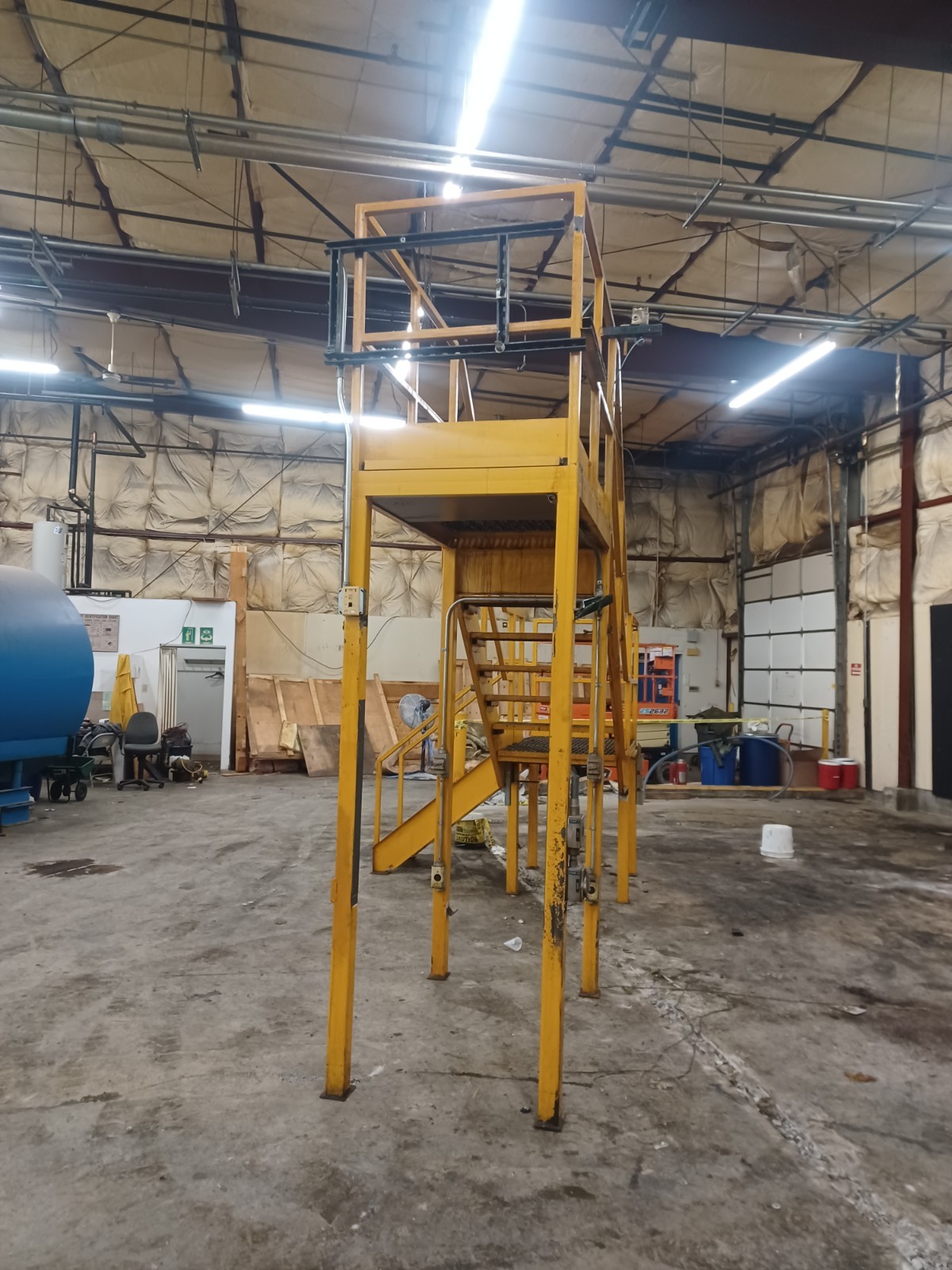 STEEL CONSTRUCTED MEZZANINE | COLOR: YELLOW | MULTI-LEVEL | MODULAR CONSTRUCTION